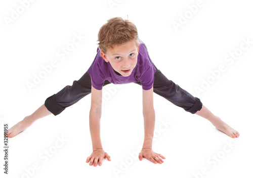 litte boy is trying to make spine