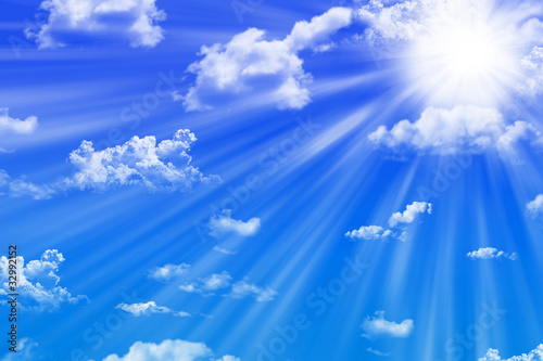 Blue sky and  sunbeams photo