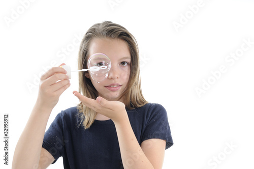 smiling girl creating bubble