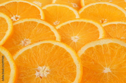 Fresh juicy orange slices background