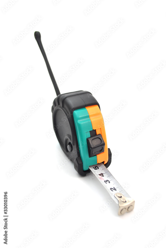 Single green, orange, black and white tape measure, isolated ove