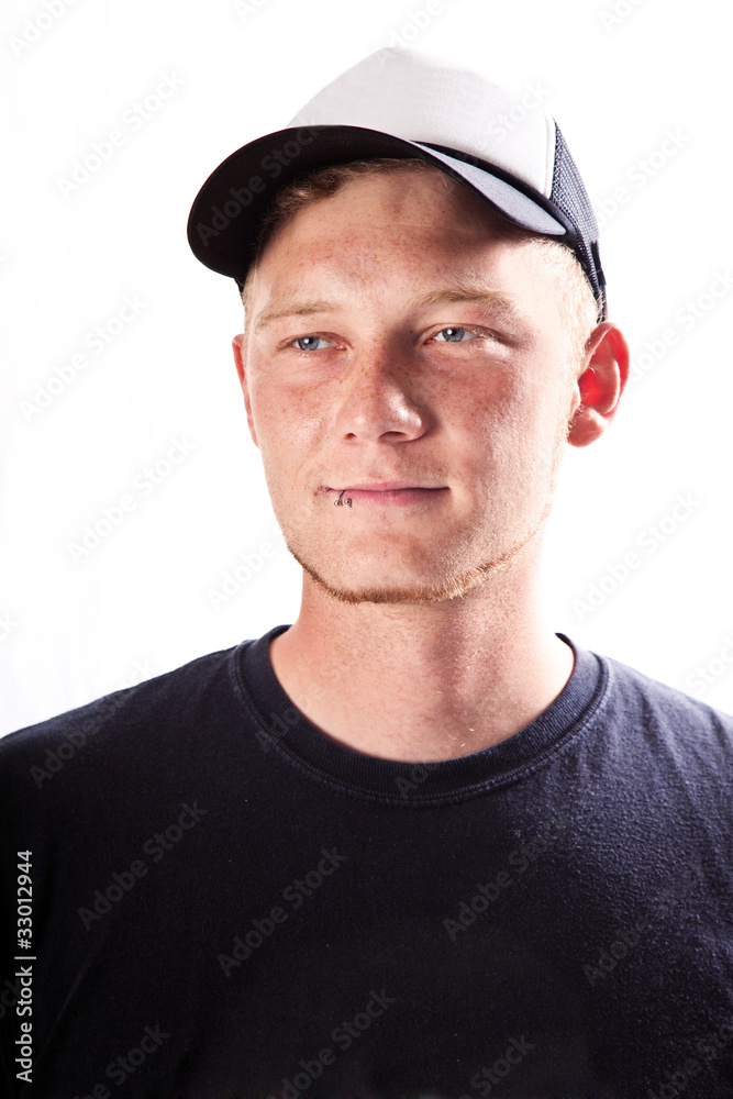 Fototapeta premium Portrait von einen jungen Mann mit Mütze 655