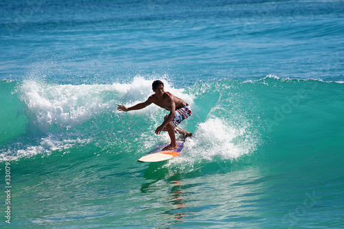 Bild auf Leinwand Surfing the waves