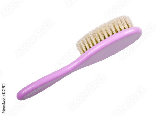 Pink hair brushes for a baby on white