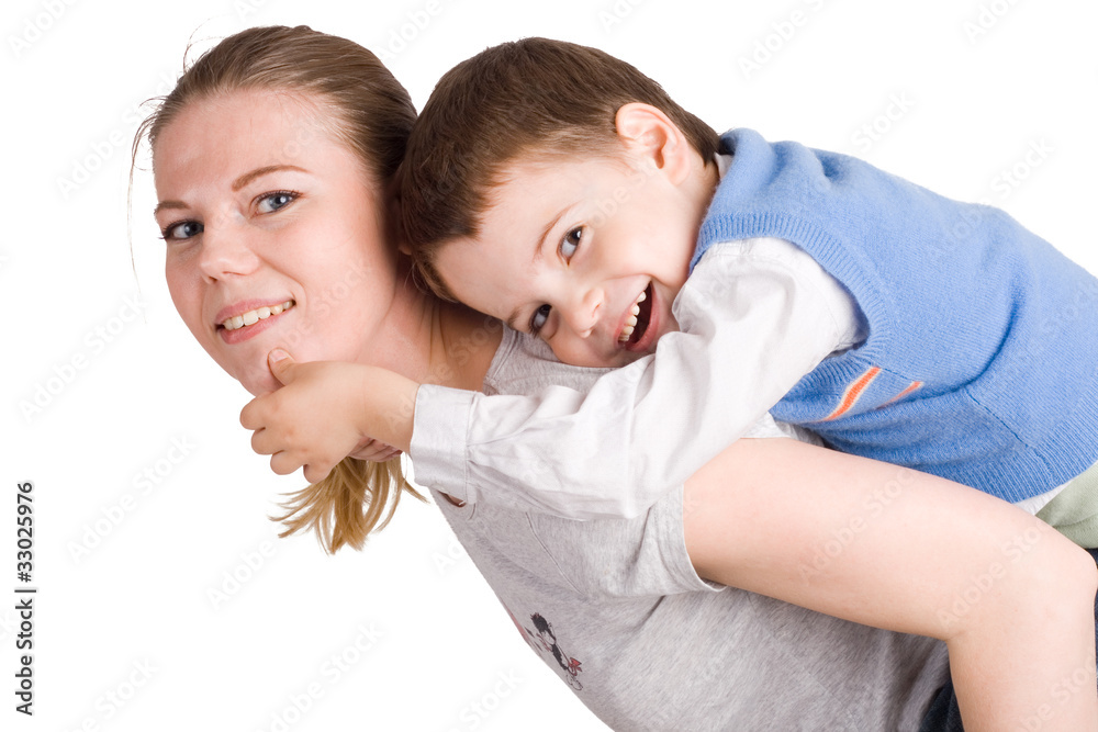 young little son embracing his pretty young mother young little son embracing his pretty young mother