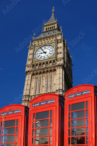 Big Ben with phone boxes  London  UK