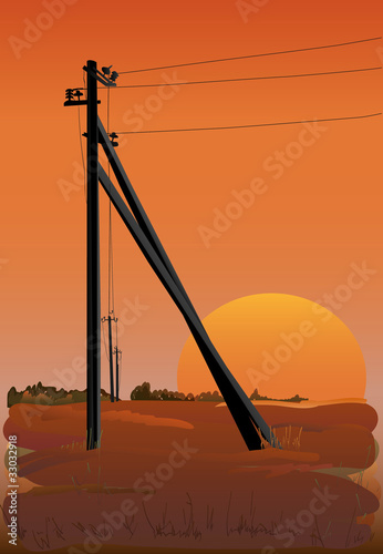 Electric power lines at sunset