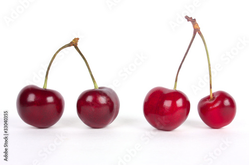 Red cherries isolated on a white background