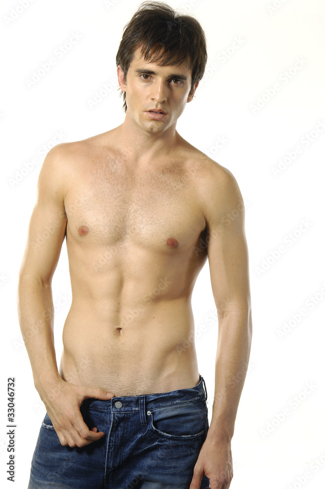 image of handsome sexy young man in blue jeans