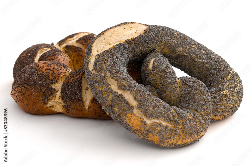 Obraz premium Laugenkranz mit Mohn