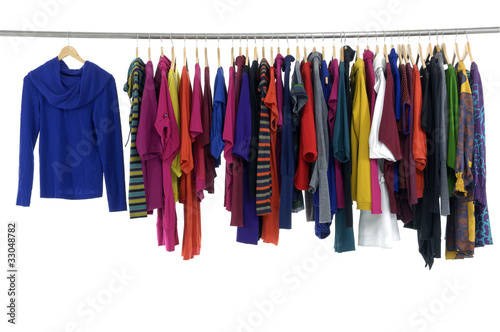 fashion clothing on hangers at the show