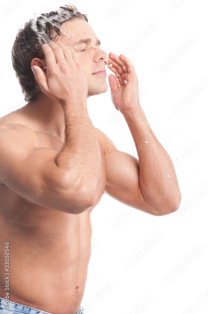 Young man wash face Young man wash face