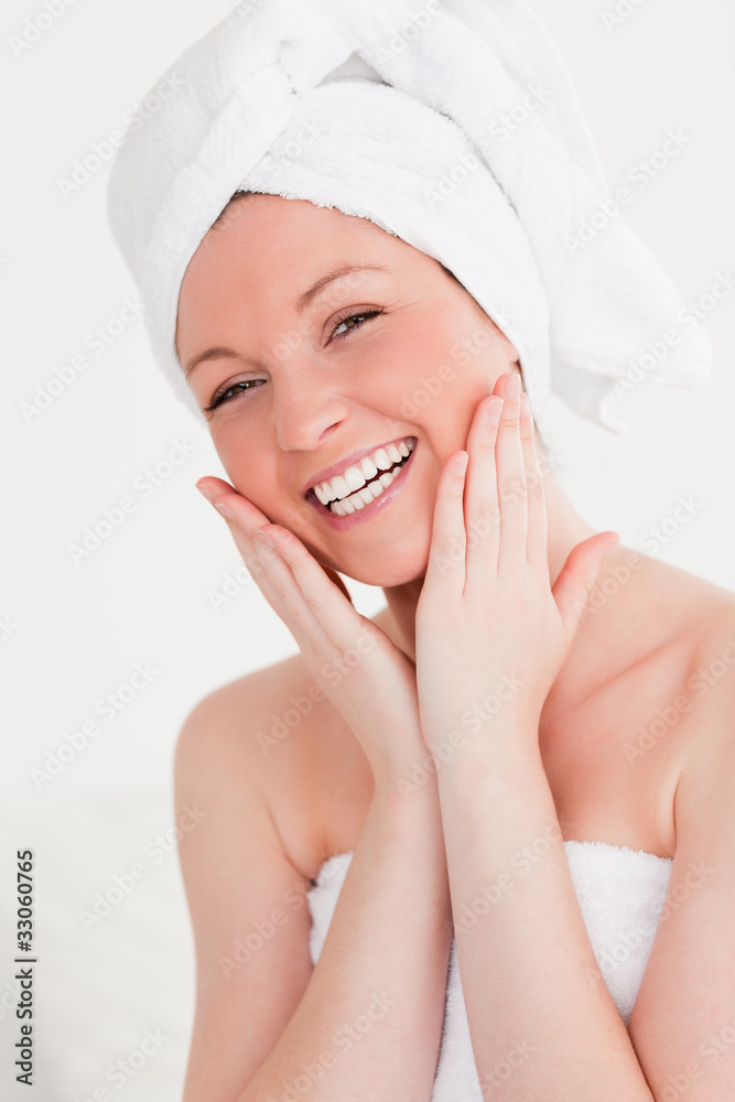 Charming young woman wrapped in a towel Charming young woman wrapped in a towel