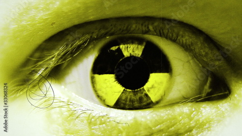 Radiation sign in eye. Stylized motion.