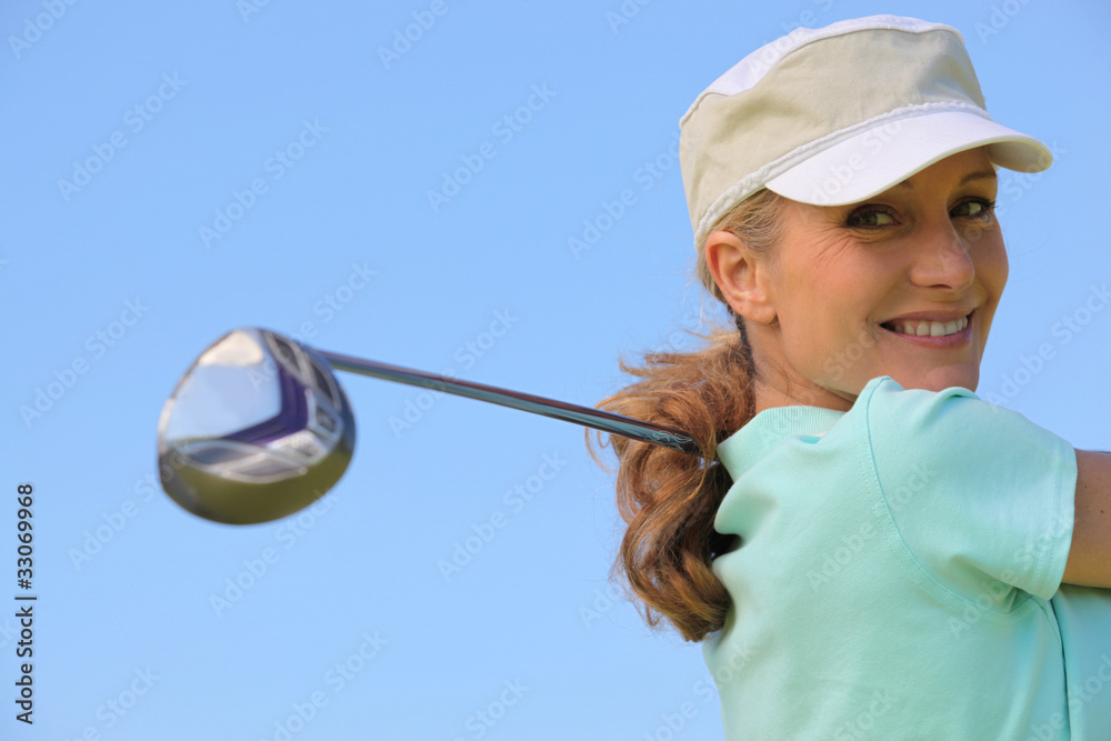 Golfer taking a swing