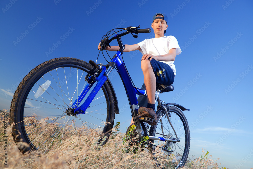 The boy with a bicycle