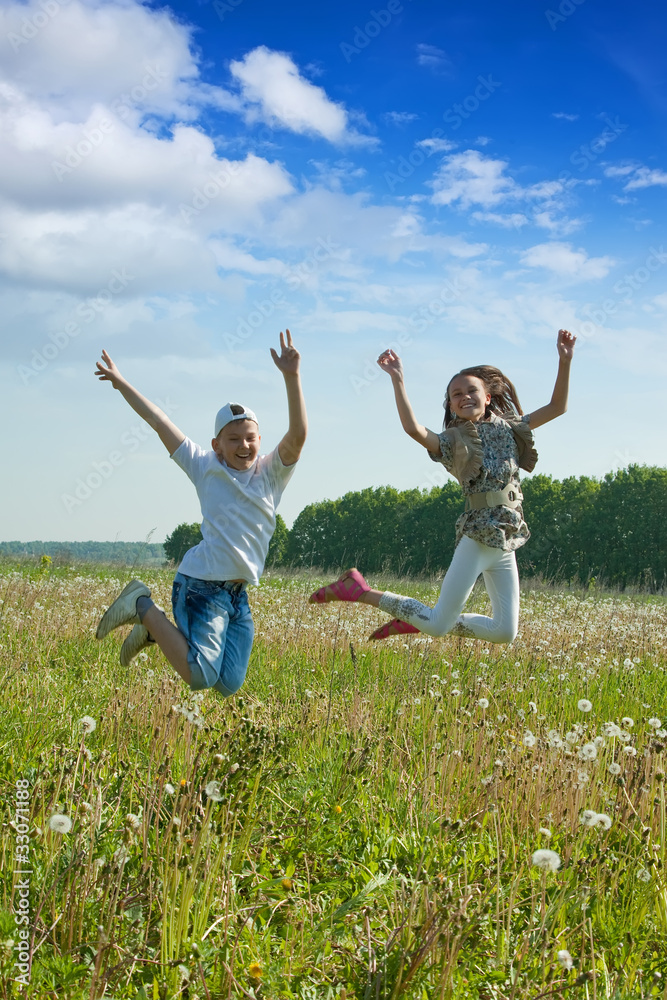 Teenager   jumping at meadow
