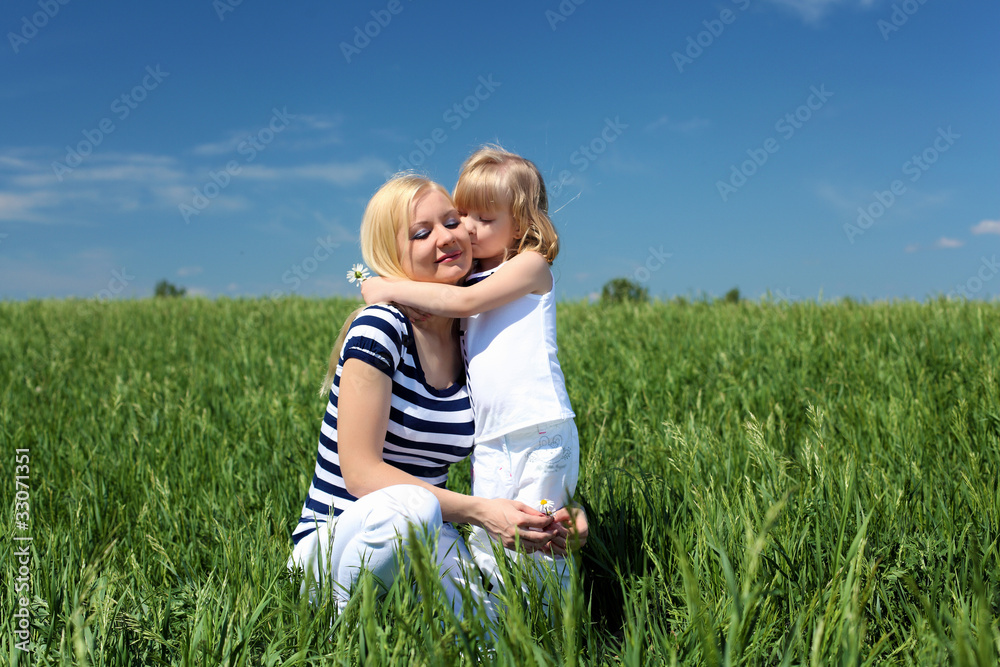 mother with her daughter outdoors