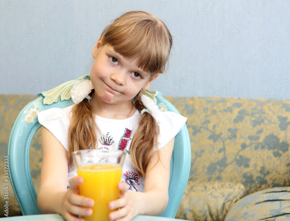 portrait of little girl with orange juice portrait of little girl with orange juice