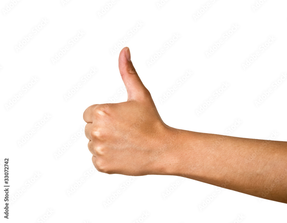 Female hand with a raised thumb. Isolated on white Female hand with a raised thumb. Isolated on white