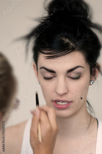 Model getting make-up