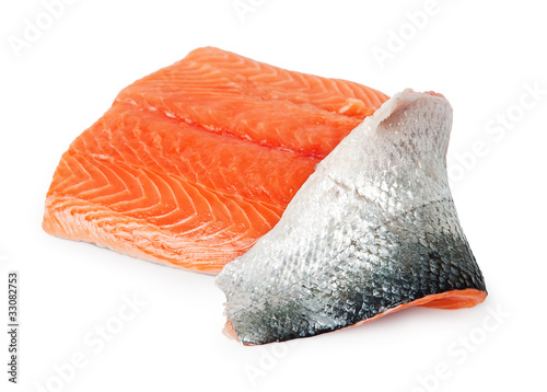 fresh uncooked salmon fillet over white .