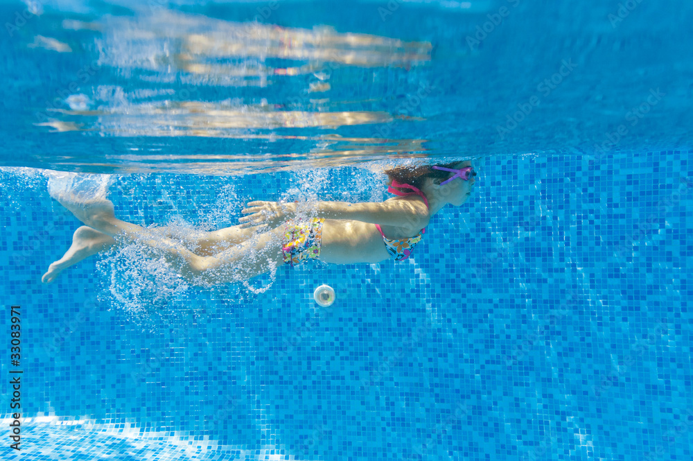 Underwater kid in swimming pool