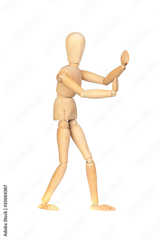 Jointed wooden mannequin pushing something Jointed wooden mannequin pushing something