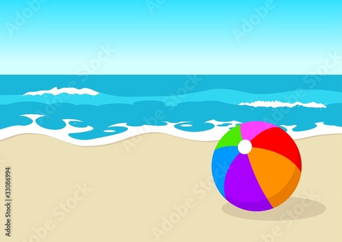 Colourful ball at the beach