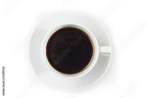 A white coffee cup with brown coffee