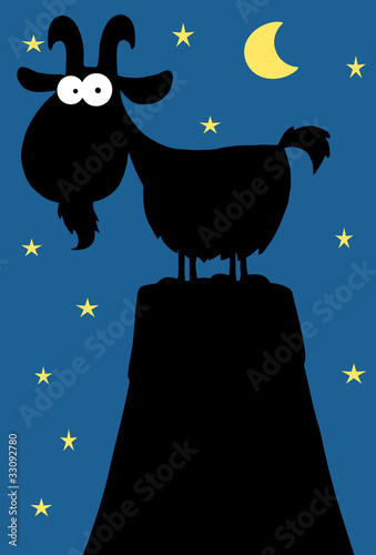 Silhouette Of Longhorn On Top Of A Mountain Peak In The Night