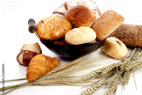 Various breadrolls and buns on grain