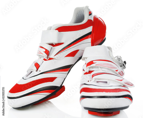 Pair road cycling shoes on white background.