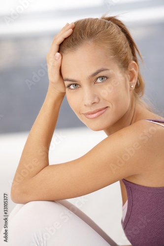 Closeup portrait of happy young woman