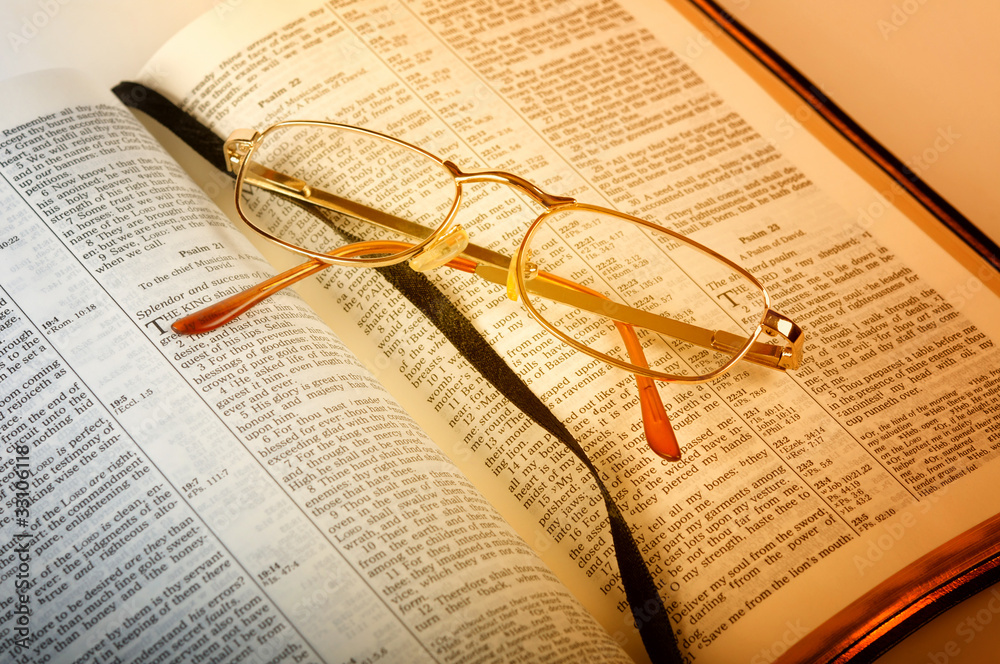 open bible with glasses Stock Photo | Adobe Stock