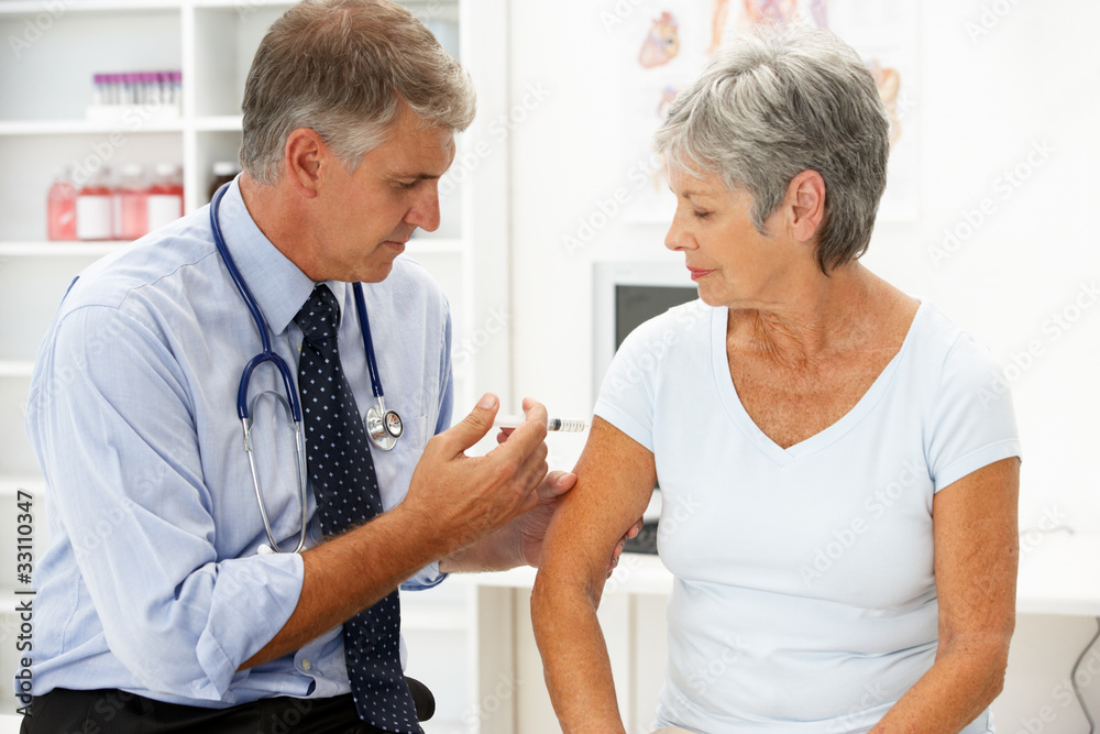 Fototapeta premium Doctor with female patient