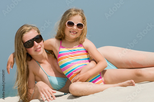 Summer vacation - girls on the beach portrait