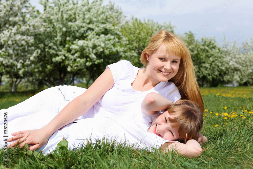 girl with mother in spring park girl with mother in spring park