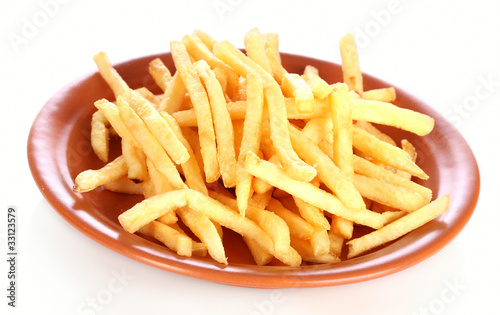 French fries in the pan isolated on white