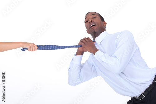 Φωτογραφία Man being yanked off camera by his tie