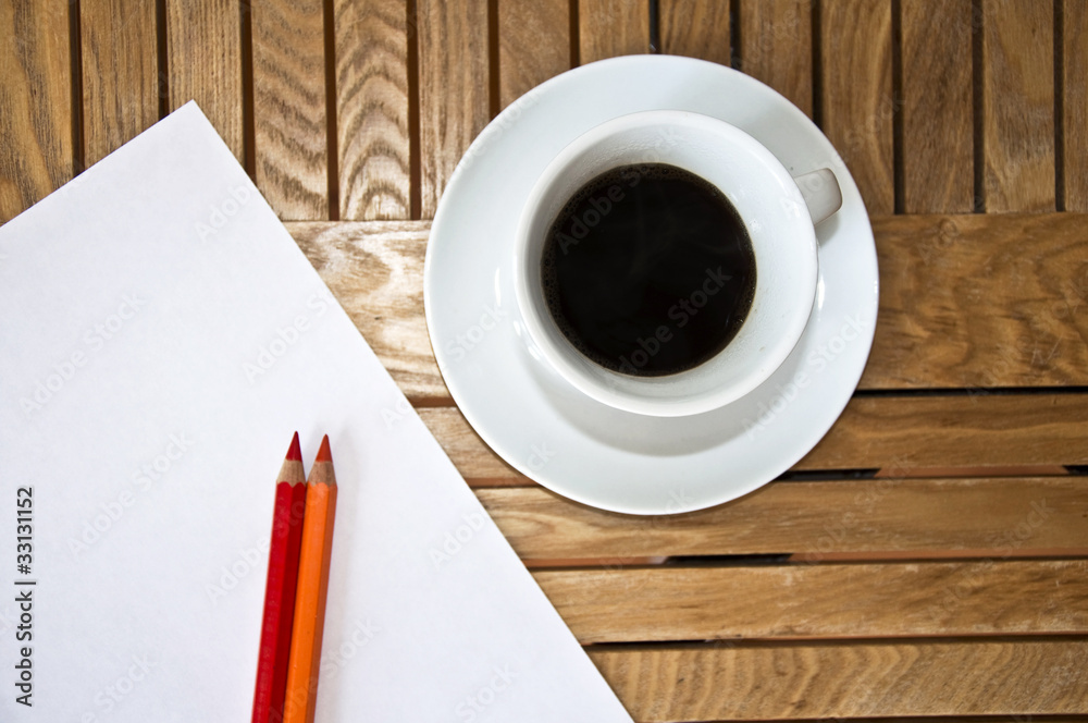 Paper blank Sheet, color pencil and a cup of coffee Paper blank Sheet, color pencil and a cup of coffee