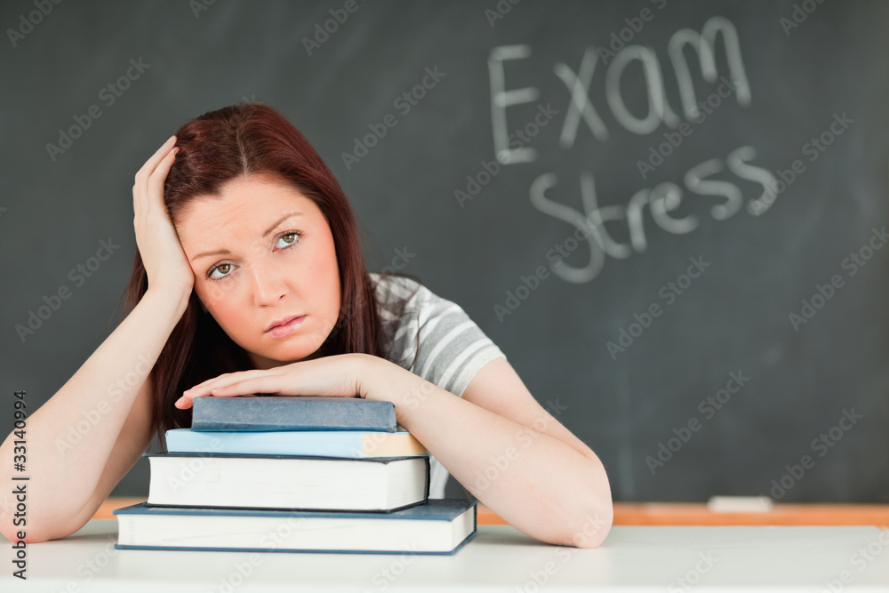 Beautilful student stressed by her examinations Beautilful student stressed by her examinations