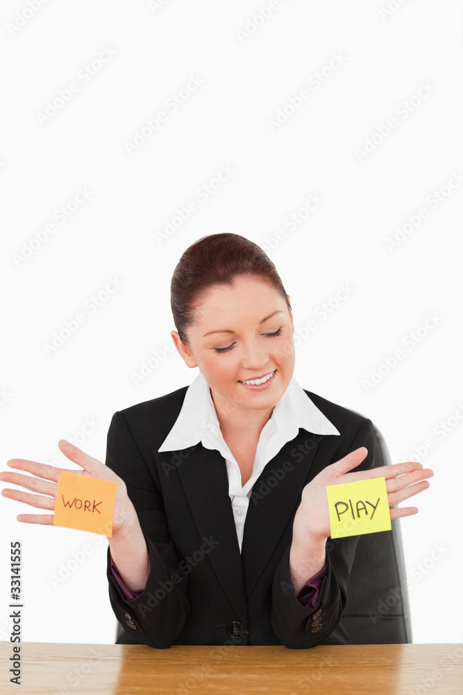 Busiinesswoman hesitating between work and play Busiinesswoman hesitating between work and play