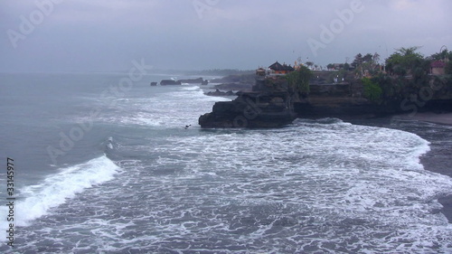 Ocean waves and old temple, Bali, Indonesia photo