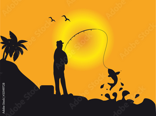 Fishermen in the sunset with fish - Angler