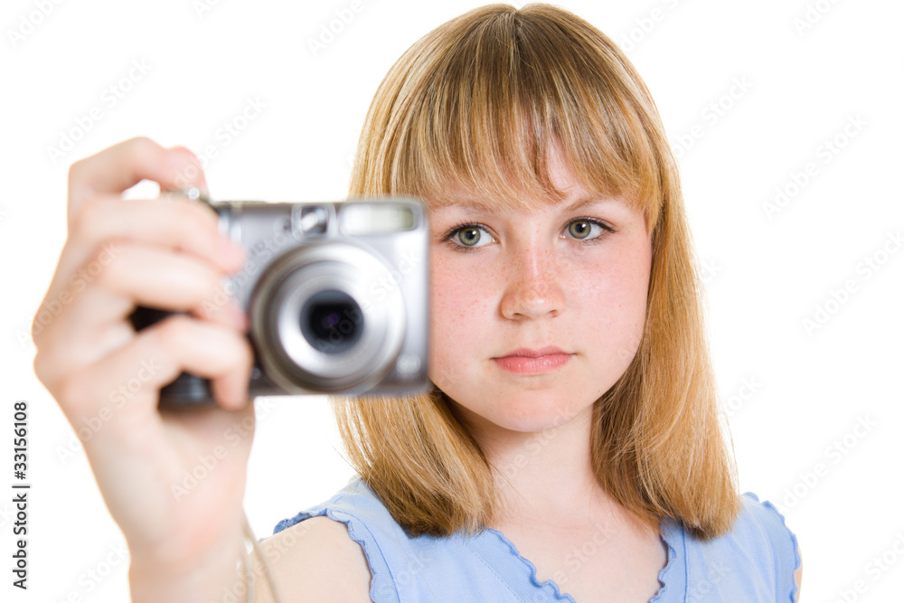 A teenager with a camera on a white background.