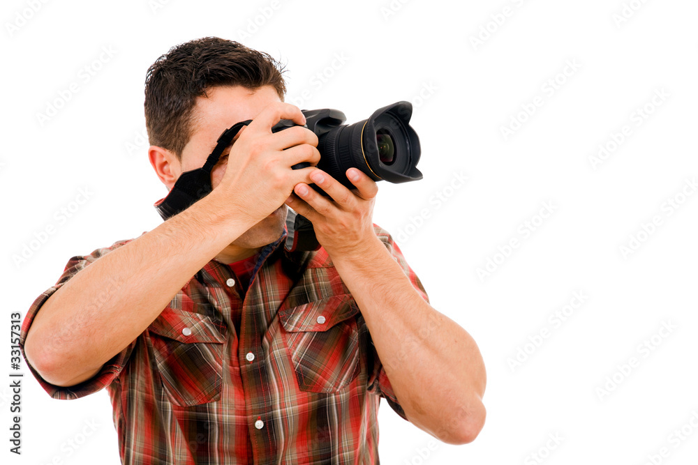 Young photographer with camera, isolated on white Young photographer with camera, isolated on white