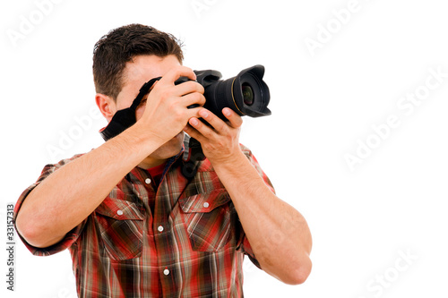 Photos Young photographer with camera, isolated on white