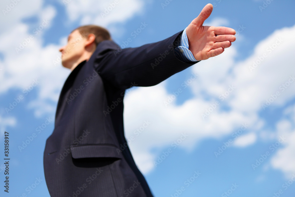 young businessman in a blue shirt and red tie young businessman in a blue shirt and red tie