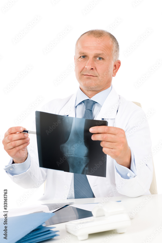 Mature senior doctor male hold x-ray Mature senior doctor male hold x-ray